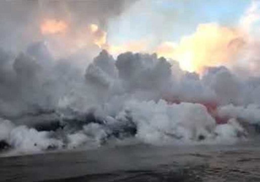 Volcanic Lava Creates Plume of Smoke as It Reaches Ocean in Hawaii