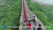 Donning traditional costume, about 1,000 performers stage a Guzheng concert on the Great Wall in north China. Click to find out how the Chinese musical instrume