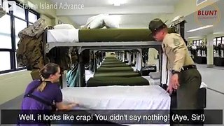 U.S. Marine tries to teach reporter how to make a military-style bed