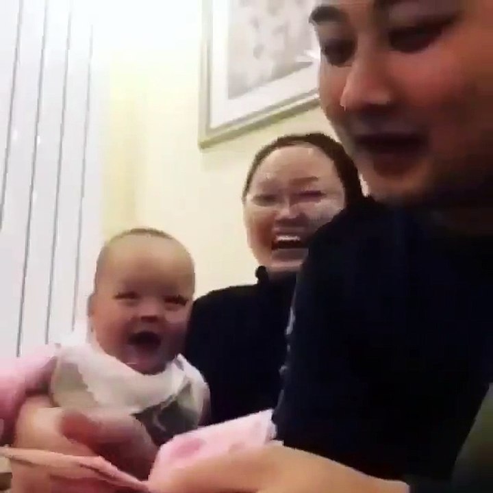 Baby loves her father counting the MONEY