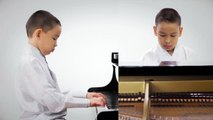 Alex, a Mongolian American boy in Virginia, is playing a traditional Mongolian song Yunden Guuguu/