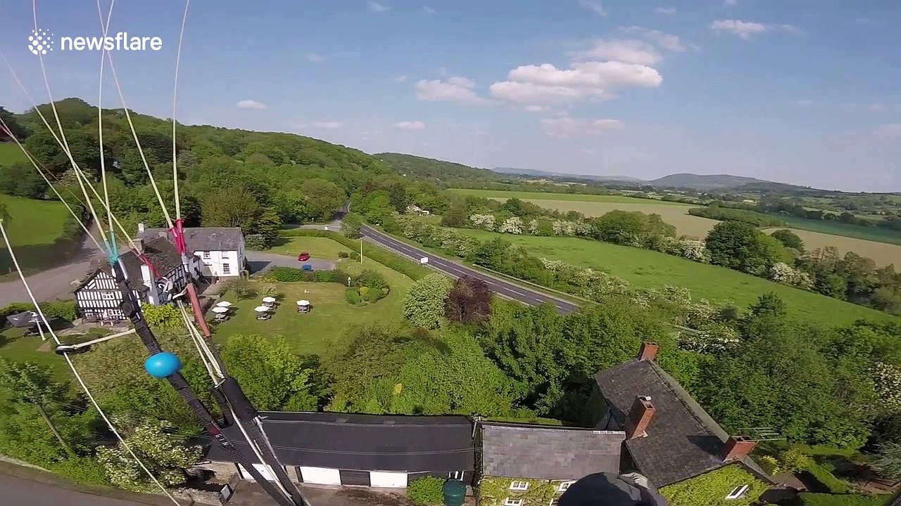 'Thirsty' UK paraglider makes surprise landing...