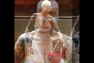 Amber Rose keeps it low key as she dotes on sweet son Seb during magical day