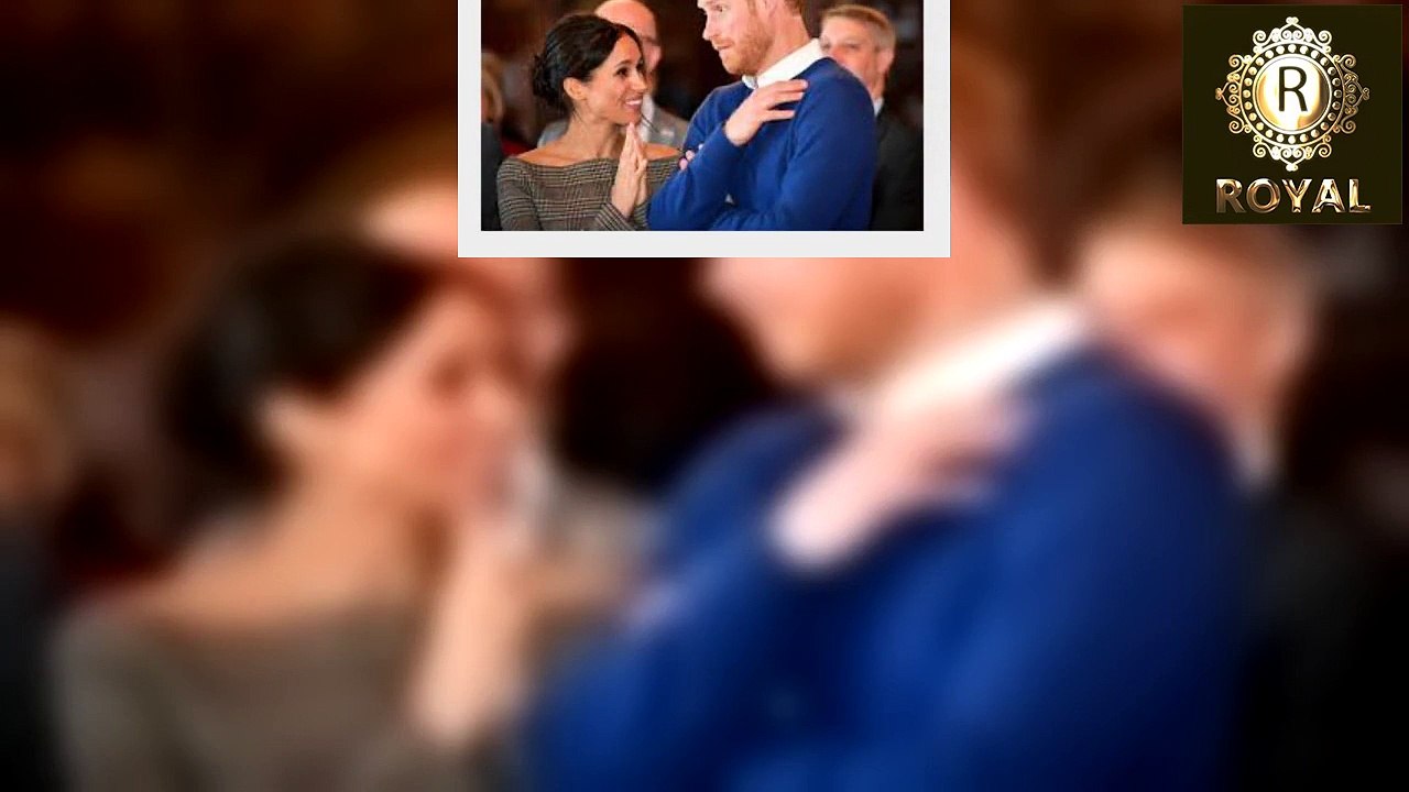 What member of the royal family is missing from the wedding picture of Meghan Markle and Harry