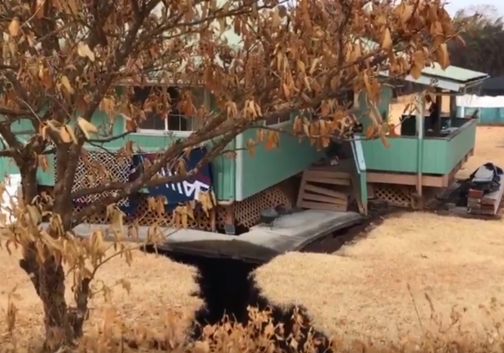 Hawaii Resident Surveys Cracks and Damage After Lava Flows Through Property