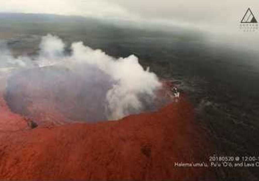 Aerial Footage Shows Ash Over Volcanic Crater as Lava Enters Ocean in Hawaii