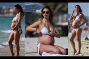 Heavily pregnant Ferne McCann showcases her blossoming baby bump in striking white bikini