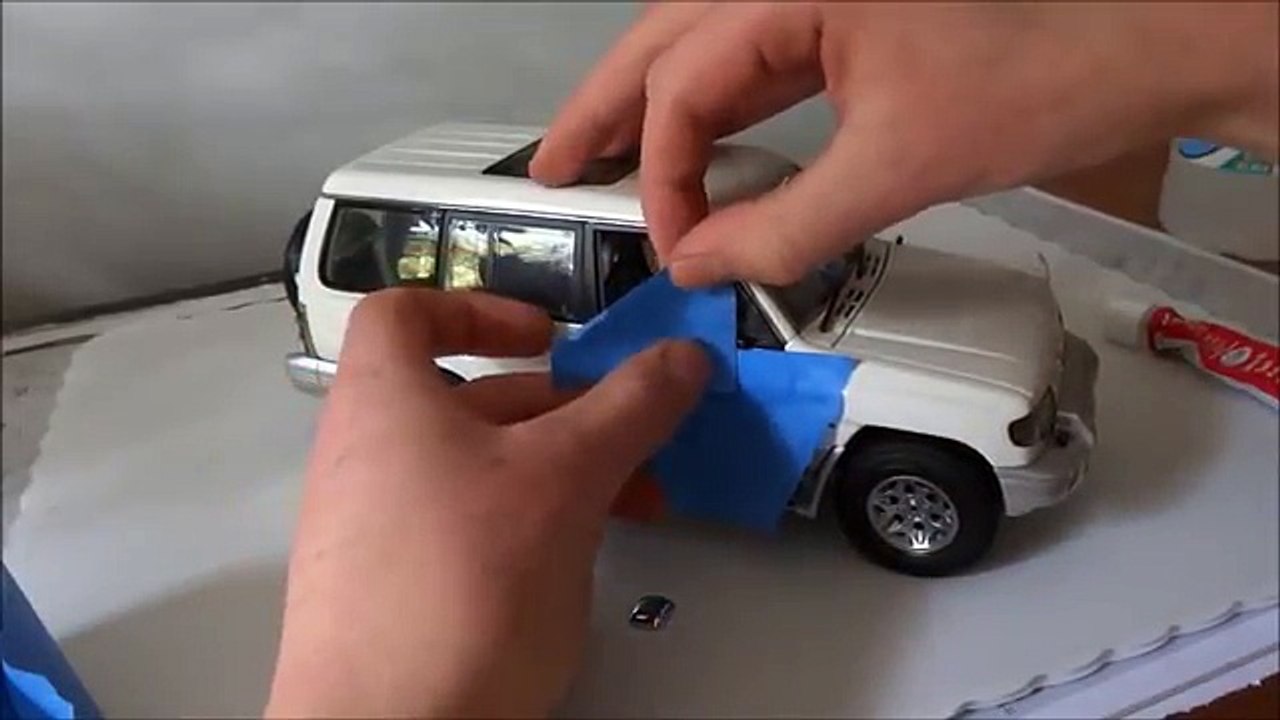 How to Repair a Mirror on a Model Car