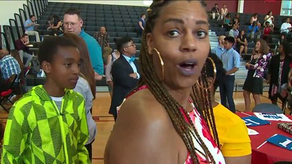 Seahawks Players Surprise High School Athletes with $20K Check for New Equipment