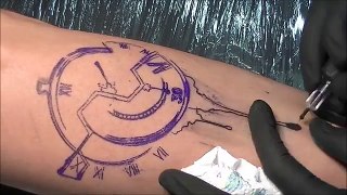 In time of color tattoo - time lapse and normal speed