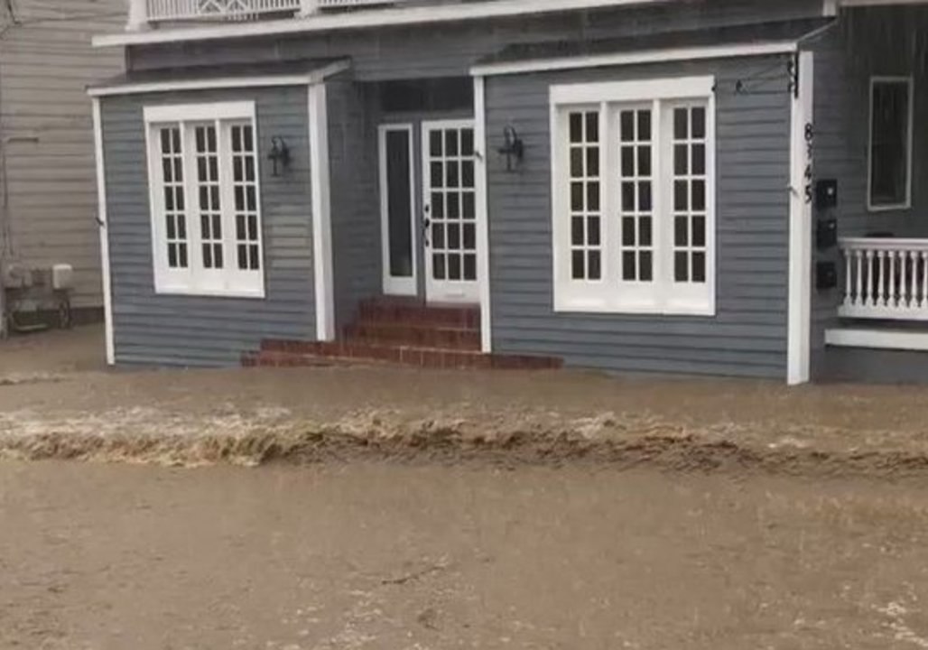 Flash Flood Rushes Down Ellicott City's Main Street
