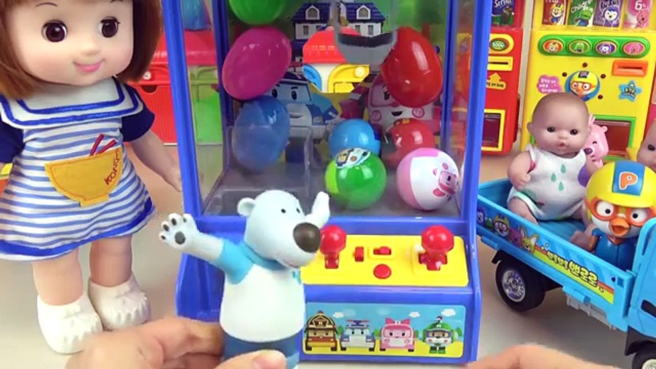 Poli surprise eggs crane machine and Baby doll, Kinder Joy toys