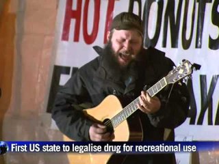 Eager customers line up outside Colorado marijuana shops