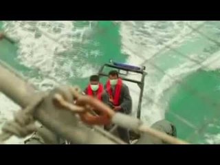 Next Media Video: QZ8501 tail found, as divers struggle to locate black boxes