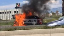 Report TV - Aksident i frikshëm në Tiranë-Durrës, njëra nga makinat në flakë, tjetra përmbyset