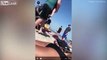 Policía golpea en la cabeza a una joven en bikini en una playa de Estados Unidos