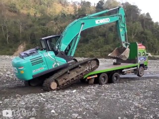 Le talent de ce conducteur de pelleteuse pour grimper dans le camion... Joli