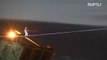 Daredevil amazes St. Petersburg with tightrope walk over Neva River