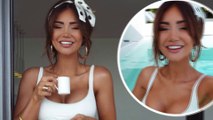 Pia Muehlenbeck displays her flawless physique in a skimpy white bikini as she soaks up the sun in Thailand