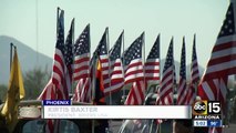 Valley group lines Veteran's National Memorial Cemetery entrance with hundreds of flags