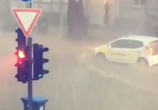 Cars Navigate Flooded Wuppertal Streets