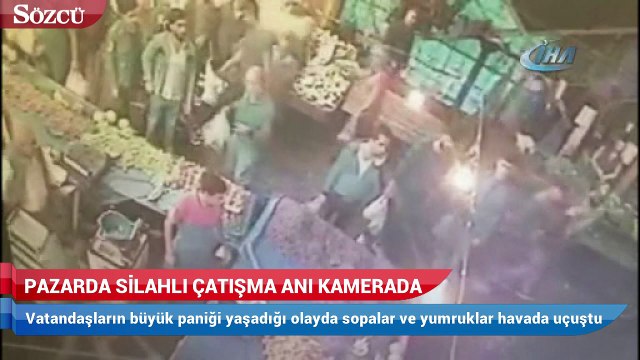 Pazarda silahlı çatışma anı kamerada