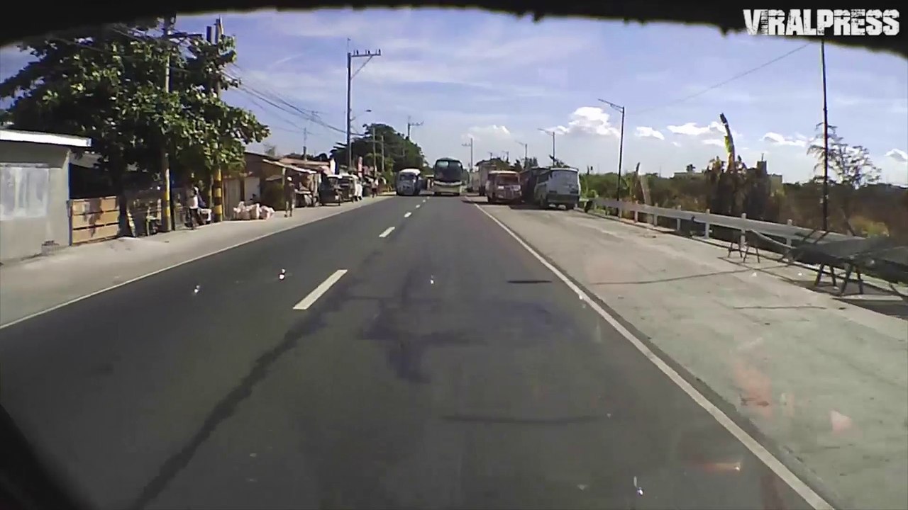 Racing Buses Inches From Crash
