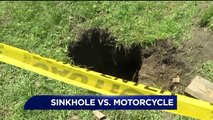 Backyard Sinkhole Nearly Swallows Family's Motorcycle