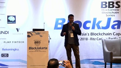OiX.Global founder Sinha Santos speaking at BlockJakarta