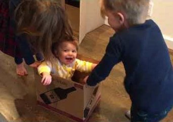 Baby Has the Time of Her Life Playing With Wine Box