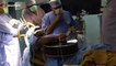 Amazing moment musician plays guitar during brain surgery