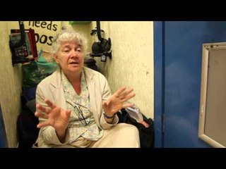 Woman squats in toilet at protest over closure