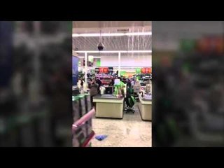 ASDA shoppers stranded after storm comes through the roof