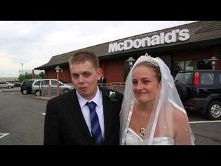 Newly married couple enjoy wedding recepetion in McDonald's