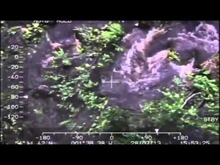 RAF rescue mother and child from raging torrent