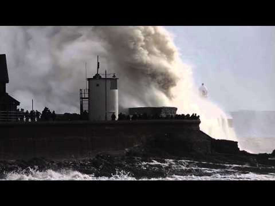 Huge waves hit Porthcawl lighthouse as Storm Charlie lashes UK