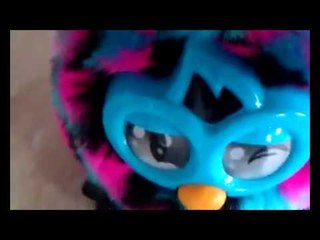 A swearing Furby that says "F**K YOU"
