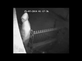 CCTV catches thugs battering front door in