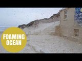 Storm Imogen whips sea into writhing foam - covers Croyde, North Devon