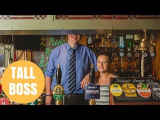 Pub Boss Is So Tall Punters Can't See His Face When Her Serves Them