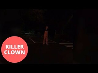 Clown with hammer is chased off by man with beer bottle