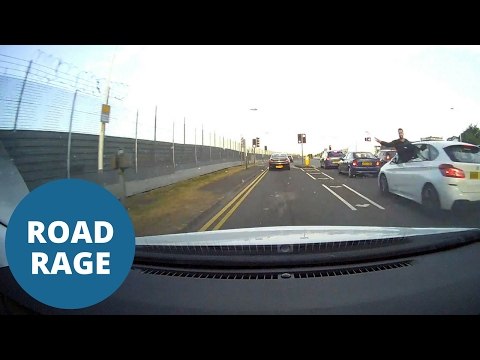 Angry passenger throws bottle of water at motorist's windscreen