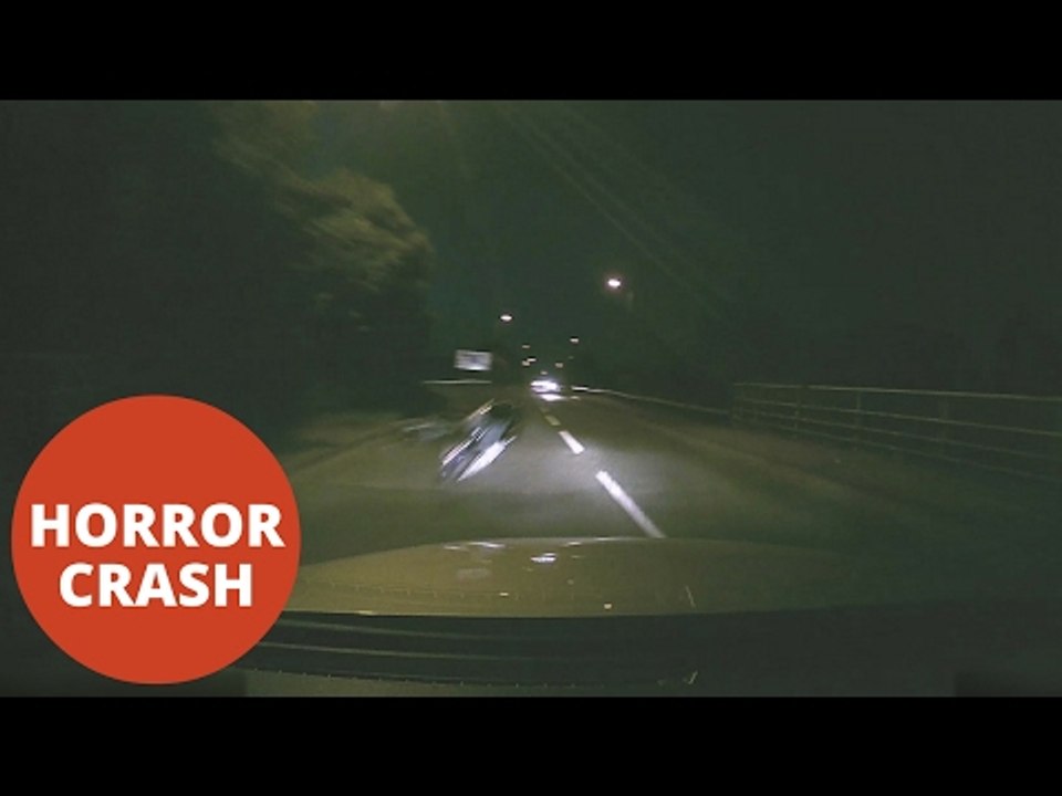 Shocking moment motorcyclist crashes head-on into car
