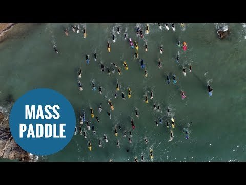 Hundreds of surfers stage mass paddle in Cornwall in tribute to father of their sport