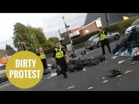 Police called after youths block road off with uncollected rubbish