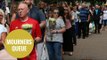 Hundreds of mourners queue to lay flowers in St Ann's Square, Manchester