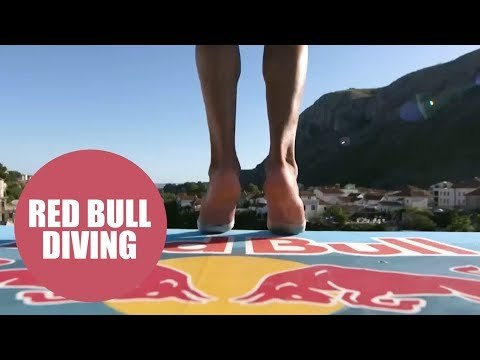 Vertigo inducing video shows a cliff diver jumping from a 27 metre platform from a bridge