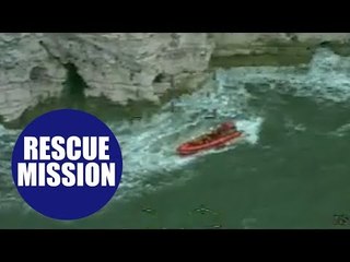 Heroic coastguards rescued a reveller who injured himself while 'tombstoning'