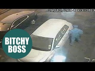 Woman catches nighmare boss scrawling the word 'bitch' on her car