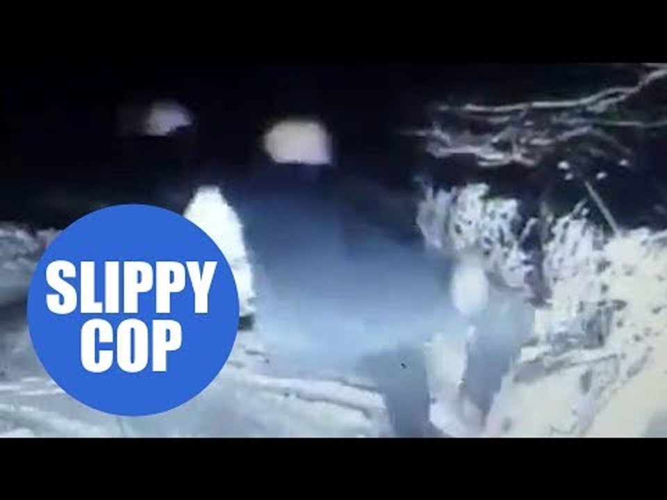 Hilarious video of police officer falling over in the snow and bursting into laughter goes viral